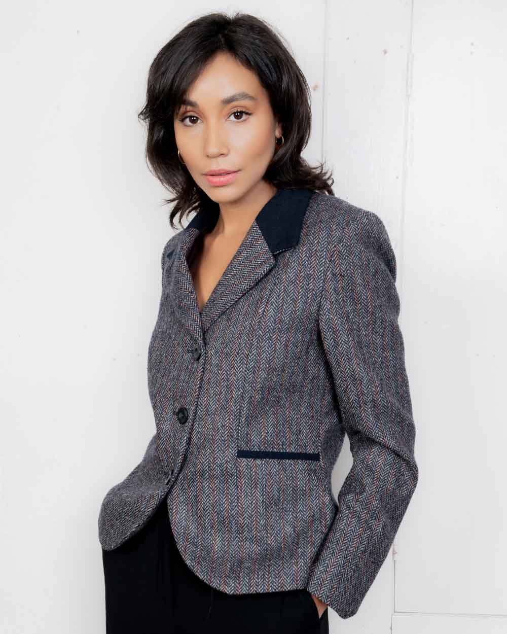 Blue Moon Herringbone Coloured Jack Murphy Sasha Tweed Jacket on indoor background 