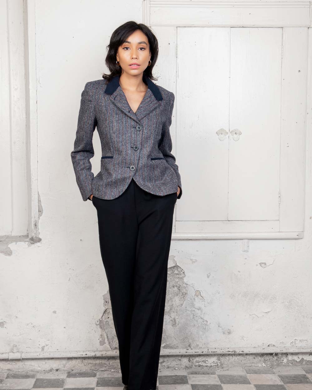 Blue Moon Herringbone Coloured Jack Murphy Sasha Tweed Jacket on indoor background 
