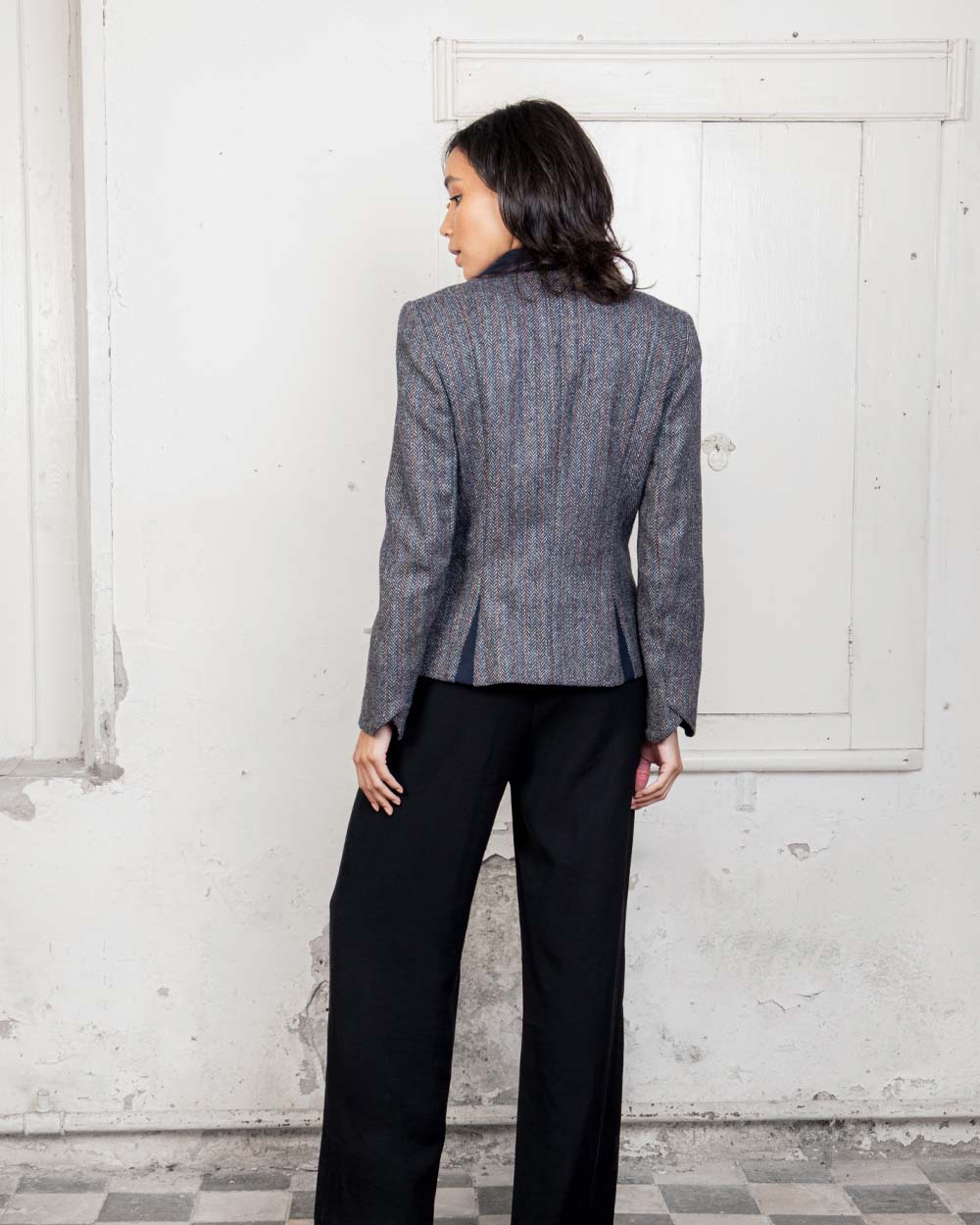 Blue Moon Herringbone Coloured Jack Murphy Sasha Tweed Jacket on indoor background 