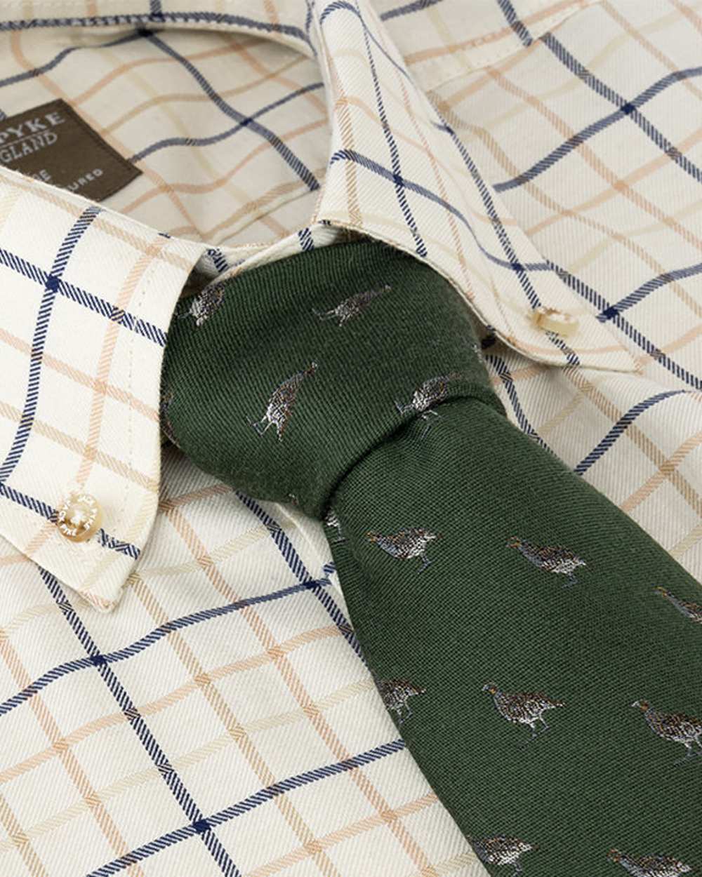 Green coloured Jack Pyke Silk Tie Partridge on shirt background 