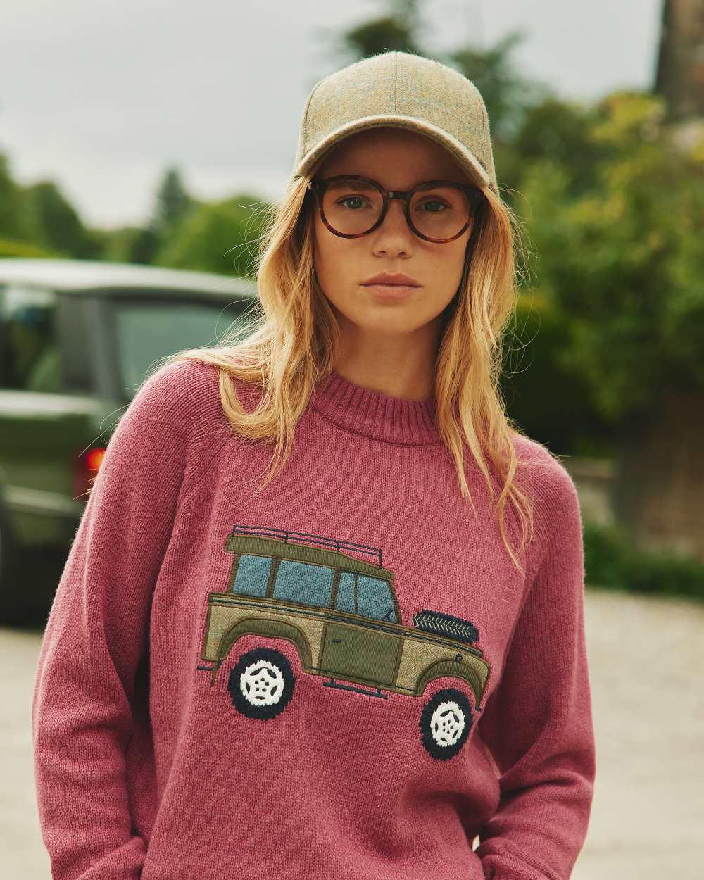 Green Coloured Joules Daley Check Cap On A Street Background 