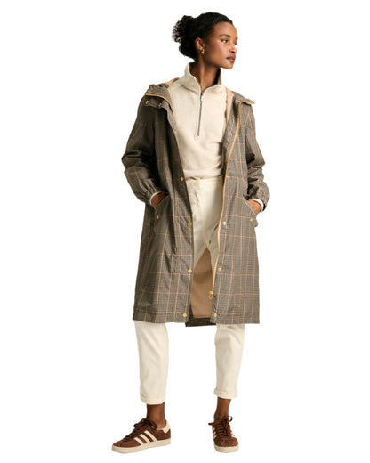 Brown Coloured Joules Holkham Waterproof Packable Raincoat With Hood On A White Background