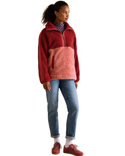 Pink Coloured Joules Tilly Half Zip Borg Fleece On A White Background 