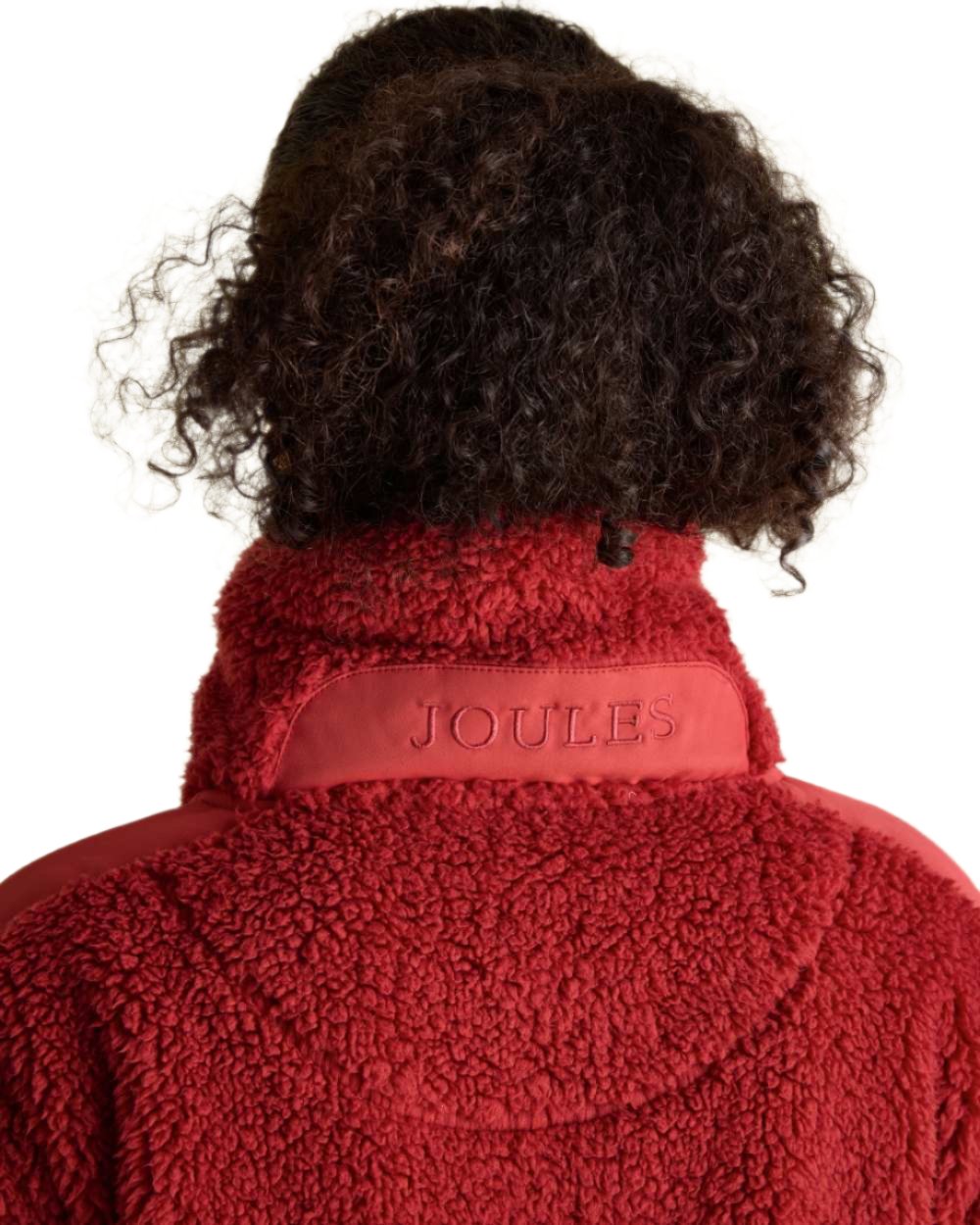 Pink Coloured Joules Tilly Half Zip Borg Fleece On A White Background 