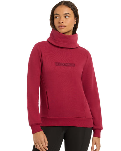 Ember Coloured LeMieux Adele Funnel Neck Sweatshirt On A White Background 