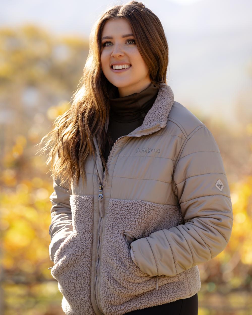 Ash Coloured LeMieux Alissa Hybrid Fleece Jacket On A Front Yard Background 