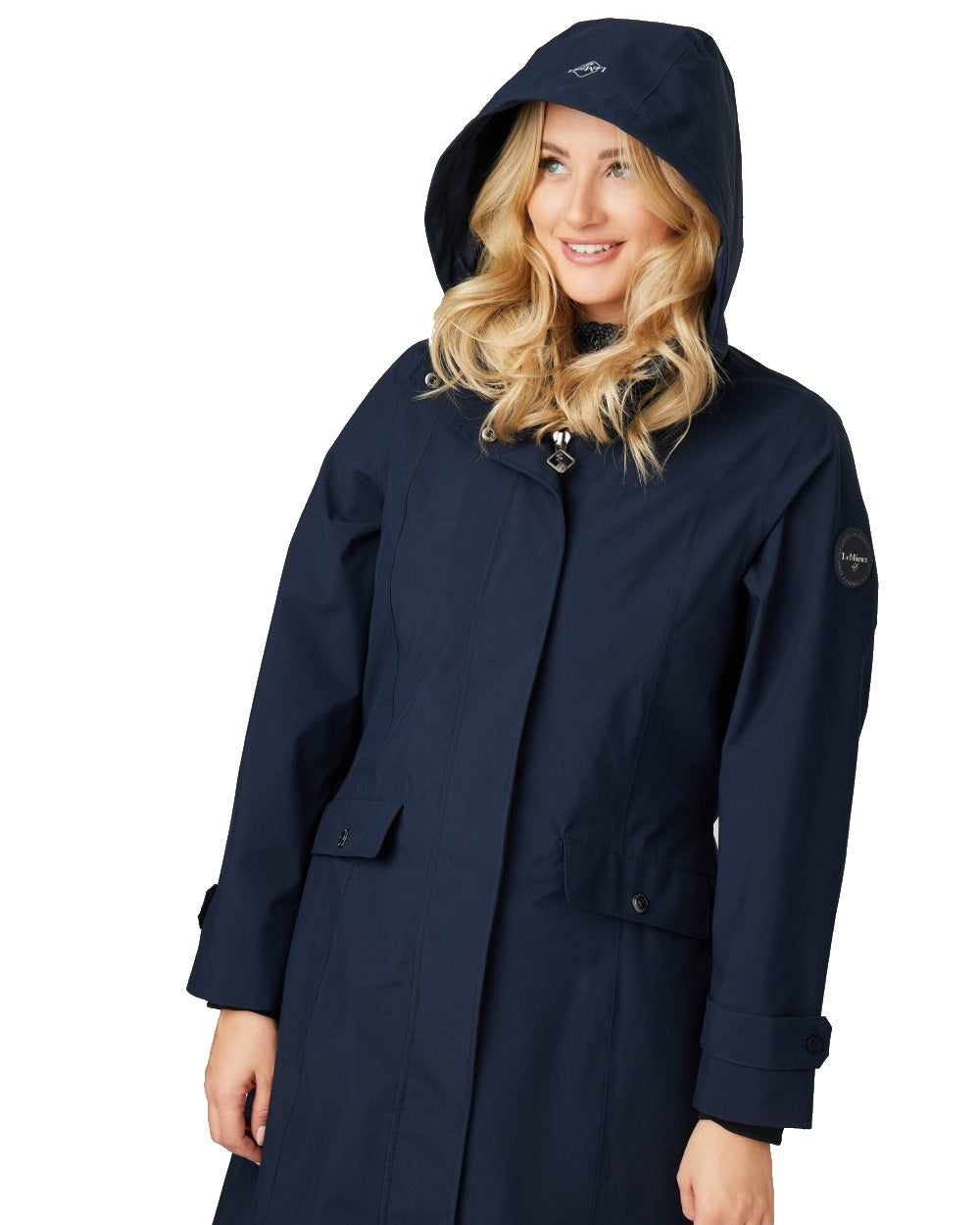 Navy coloured LeMieux Amelie Waterproof Lightweight Riding Coat on white background 