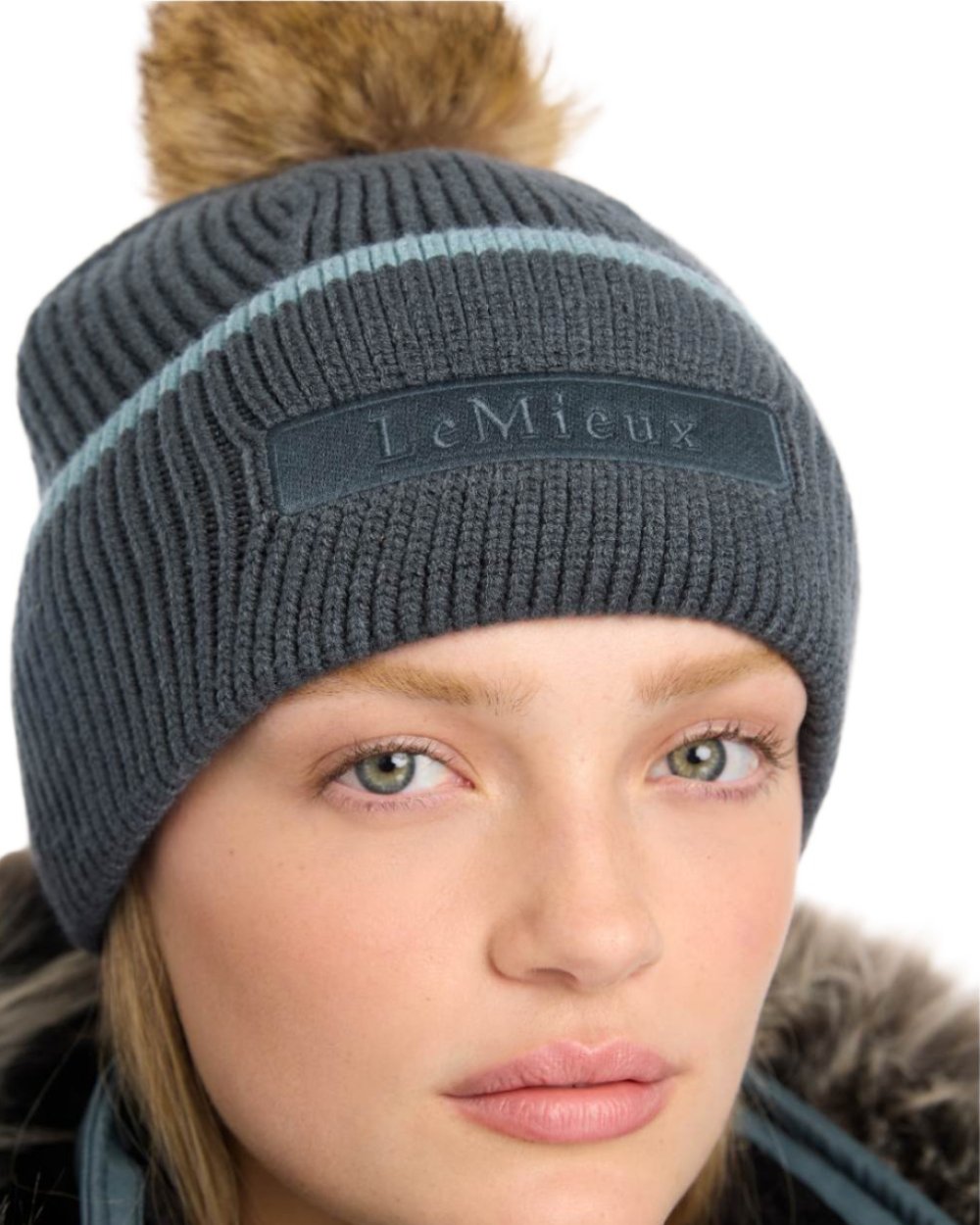 Petrol Coloured LeMieux Clara Cable Beanie On A White Background 