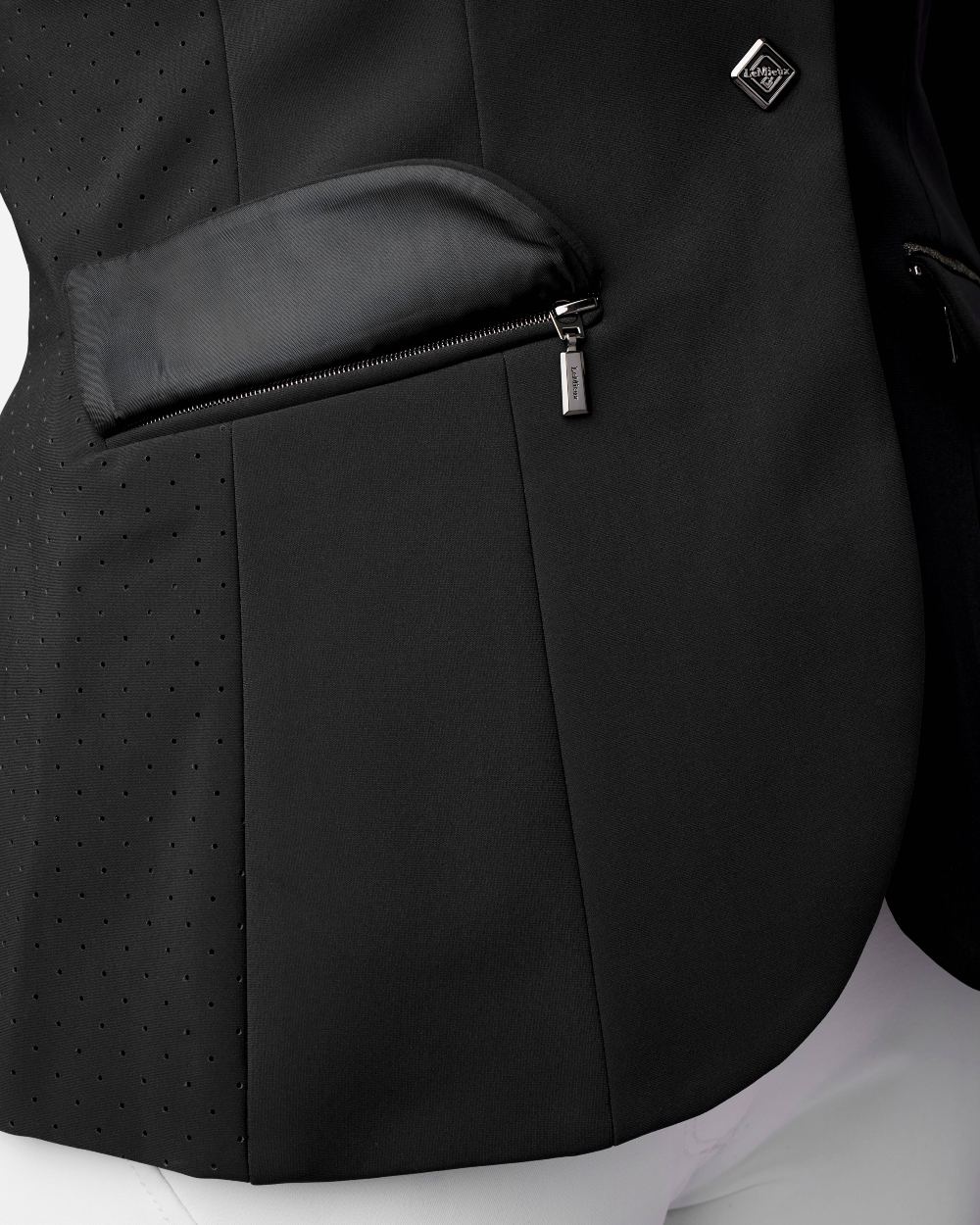 Black coloured LeMieux Dynamique Show Jacket on white background 