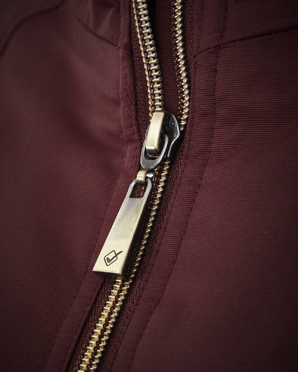 Burgundy coloured LeMieux Elite Crew Jacket on white background 