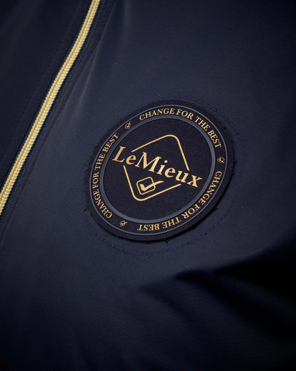 Navy coloured LeMieux Elite Crew Jacket on white background 