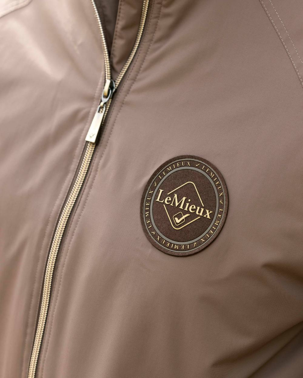 Walnut coloured LeMieux Elite Crew Jacket on white background 