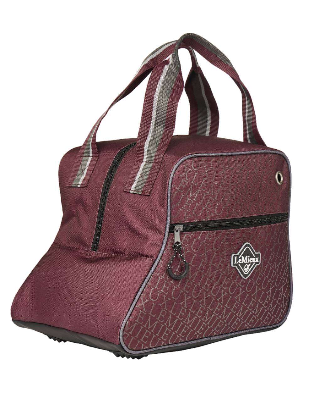 Burgundy coloured LeMieux Elite Pro Short Boot Bag on white background 