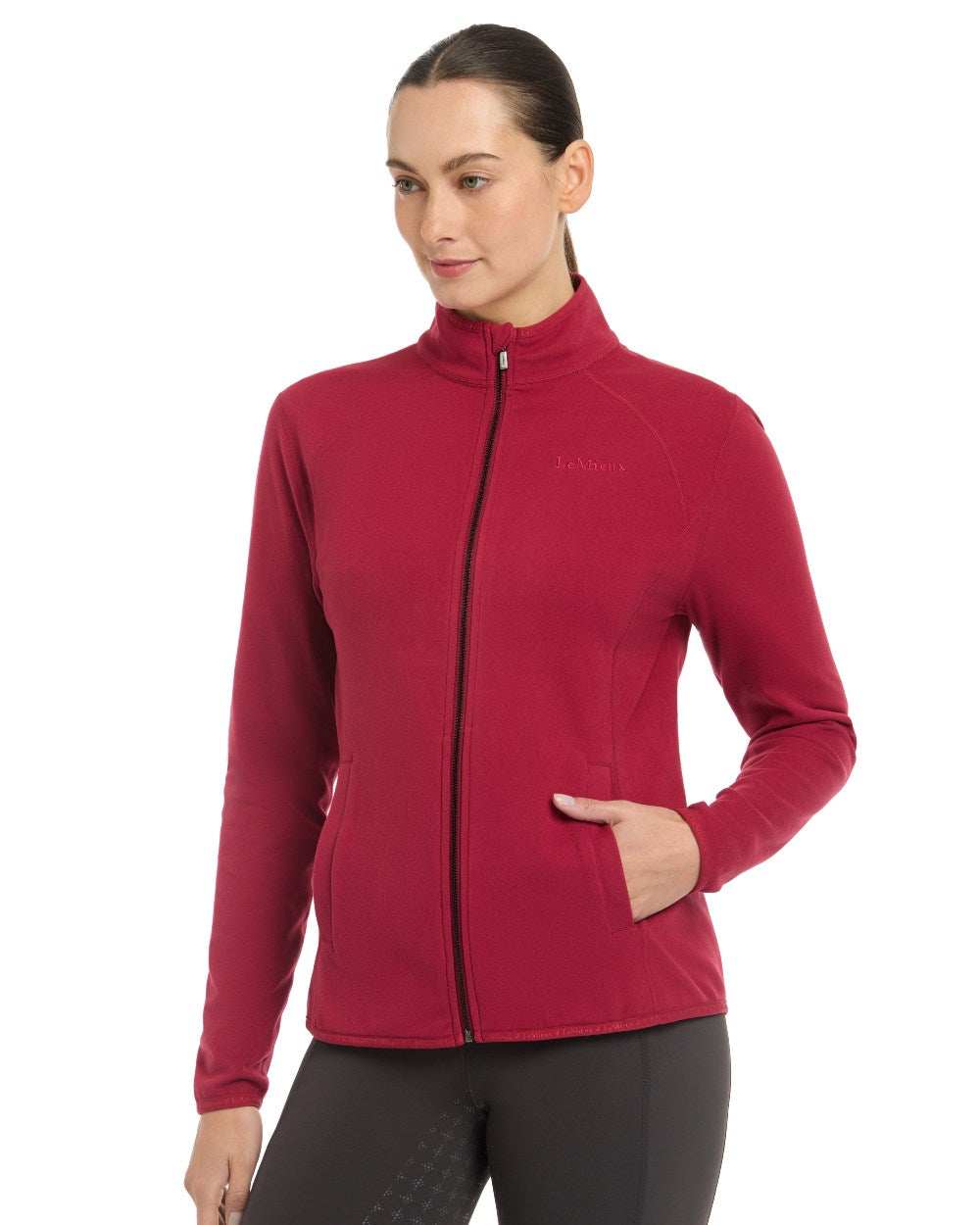 Ember Coloured LeMieux Faye Fleece Zip Through Jacket On A White Background 