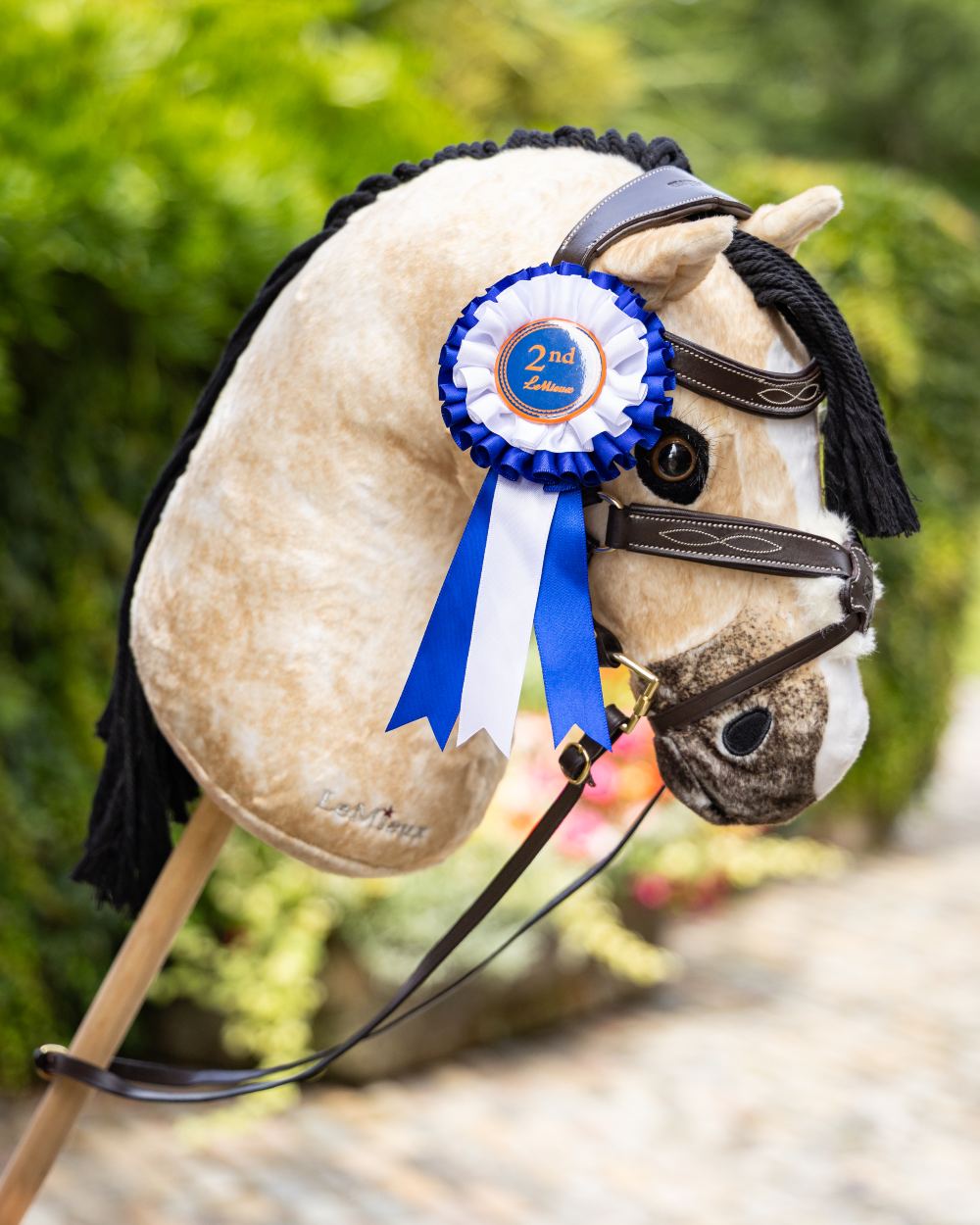 Dream Coloured LeMieux Hobby Horse On A Outer Yard Background 