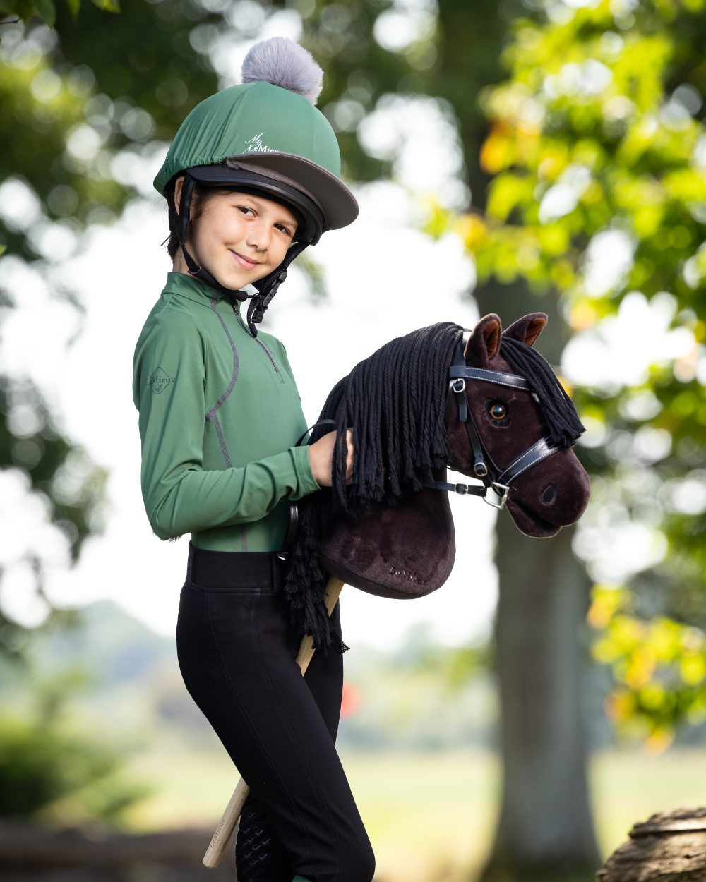 Freya Coloured LeMieux Hobby Horse On A Outer Yard Background 