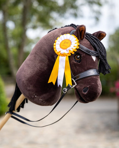 Freya Coloured LeMieux Hobby Horse On A Outer Yard Background 