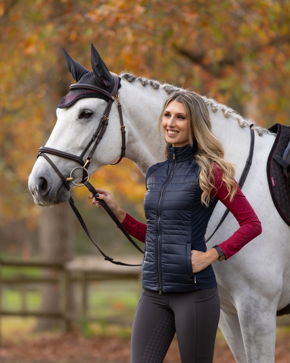 Navy Coloured LeMieux Juliette Gilet On A Park Background 