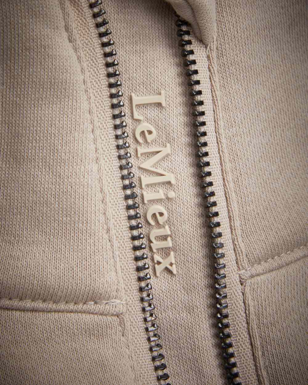 Ash Stone Coloured LeMieux Kali Quarter Zip Sweat On A White Background 