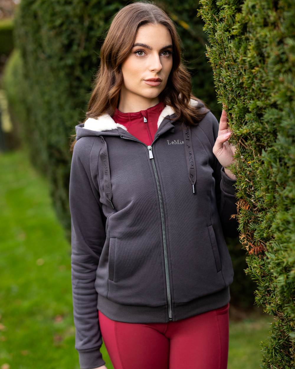 Cinder Coloured LeMieux Leia Lined Hoodie On A Park Background 