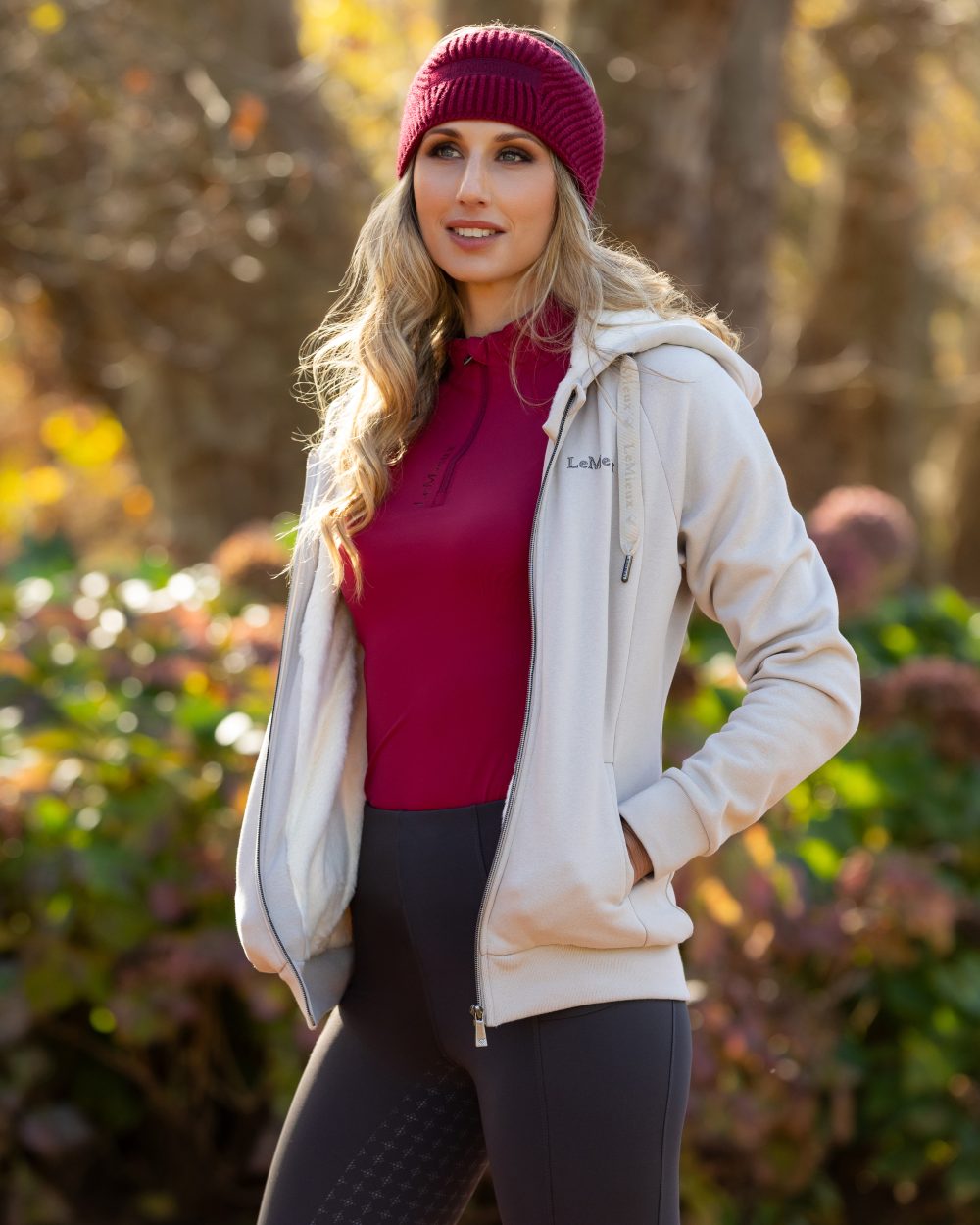 Stone Coloured LeMieux Leia Lined Hoodie On A Park Background 