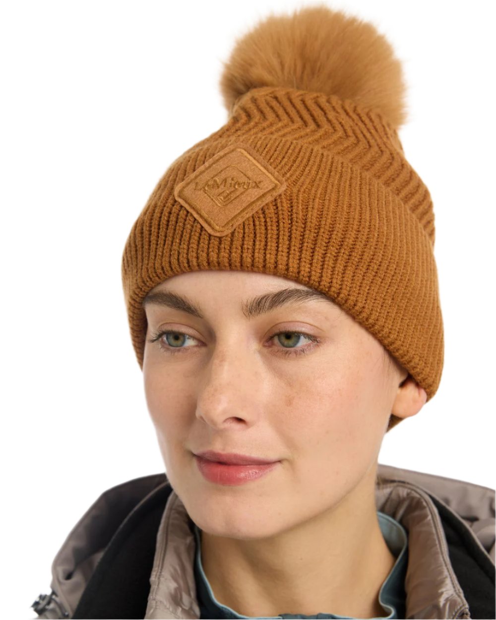 Ginger Coloured LeMieux Lila Beanie On A White Background 