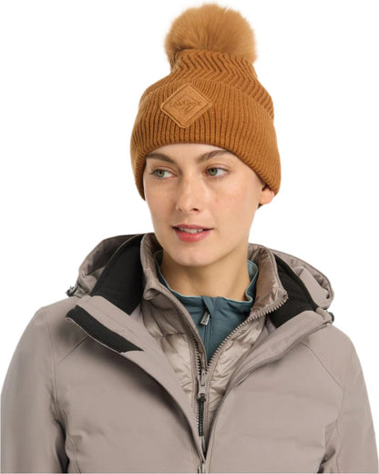 Ginger Coloured LeMieux Lila Beanie On A White Background 