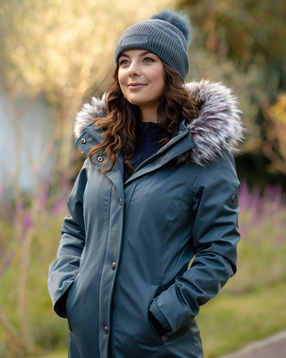 Petrol Coloured Lemieux LM Beanie On A Park Background 