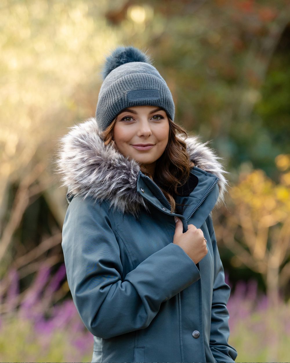 Petrol Coloured Lemieux LM Beanie On A Park Background 