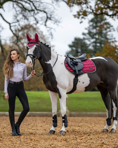 Ember Coloured LeMieux Loire Classic Close Contact Square On A Outer Yard Background 