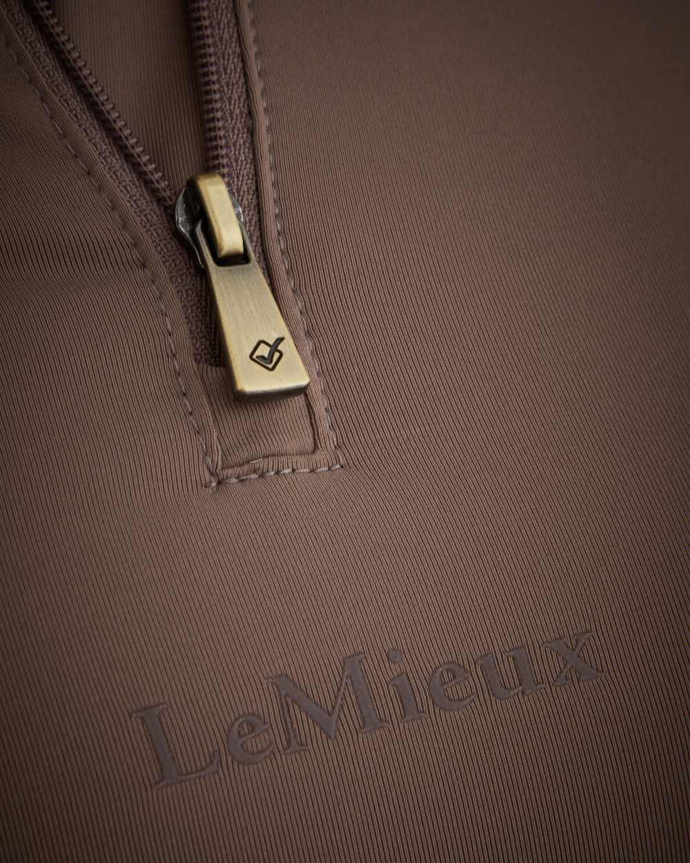 Walnut coloured LeMieux Mia Mesh Long Sleeve Base Layer on white background 