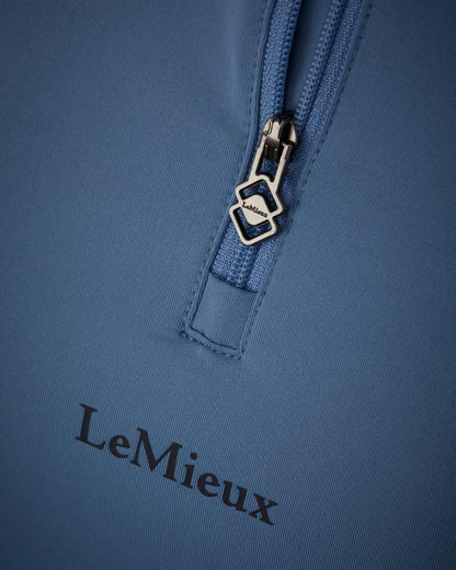 Ice Blue coloured LeMieux Mia Mesh Short Sleeve Base Layer on white background 