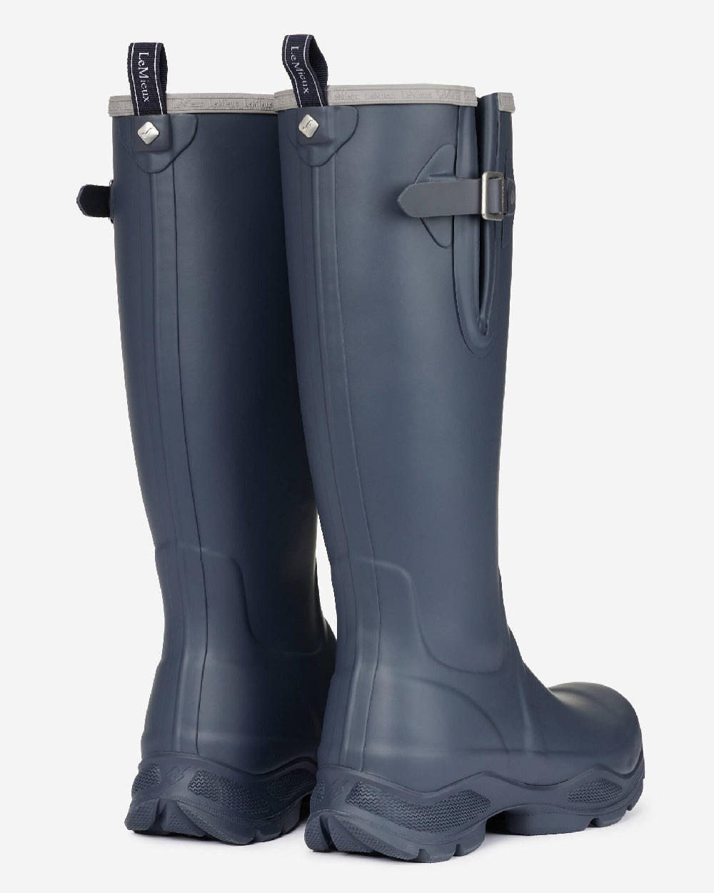 Navy coloured LeMieux Stride Wellington Boots on grey background 