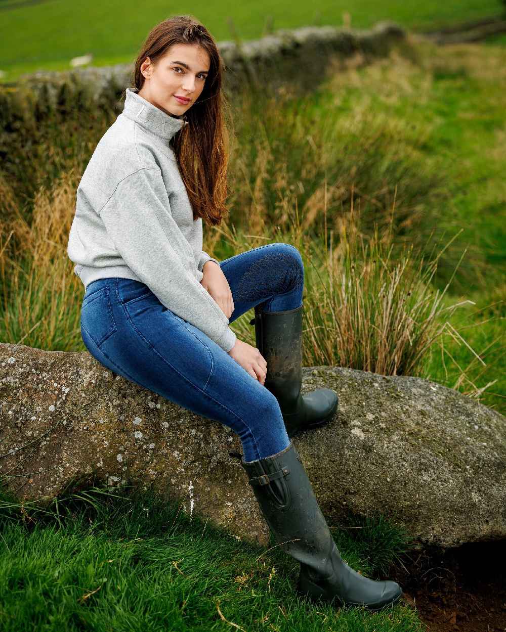 Oak coloured LeMieux Stride Wellington Boots on grassy background 