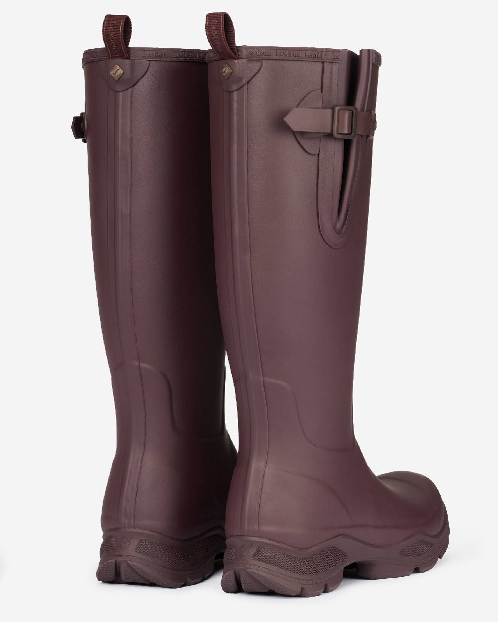 Port coloured LeMieux Stride Wellington Boots on grey background 