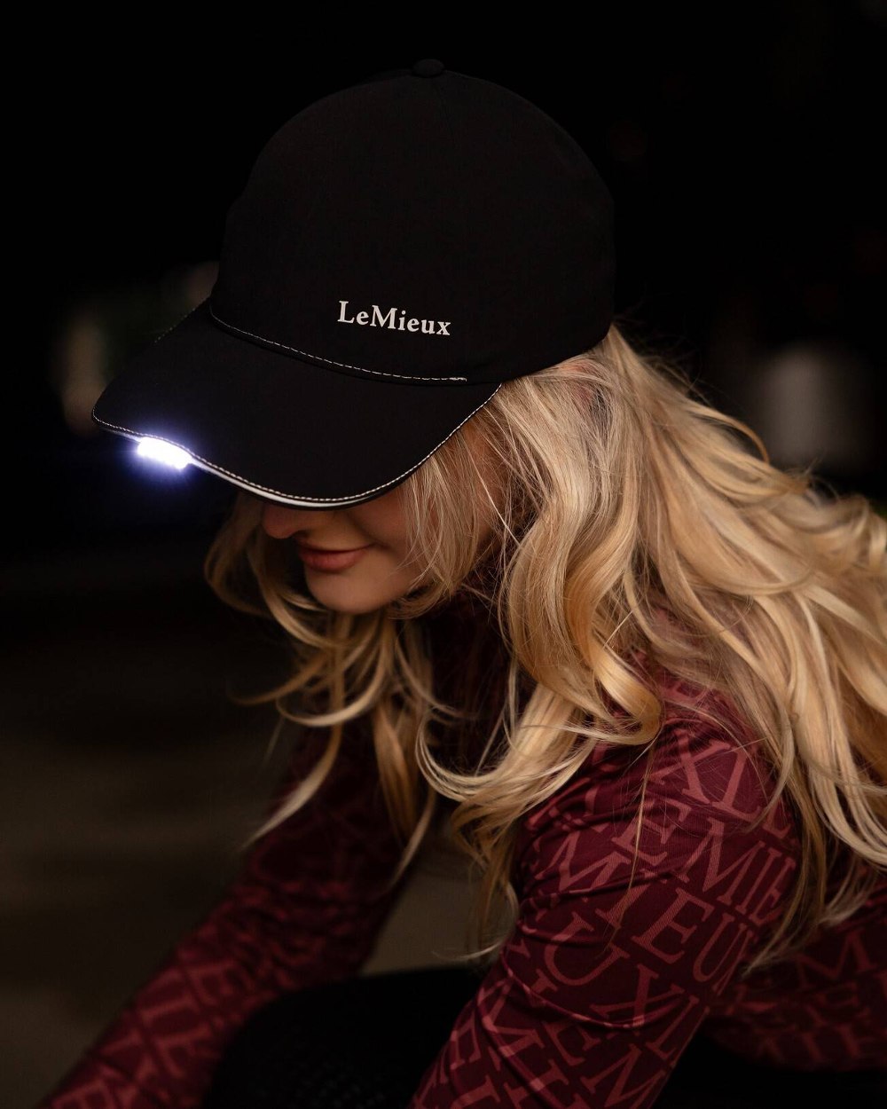 Black coloured LeMieux Torch Cap on black background 