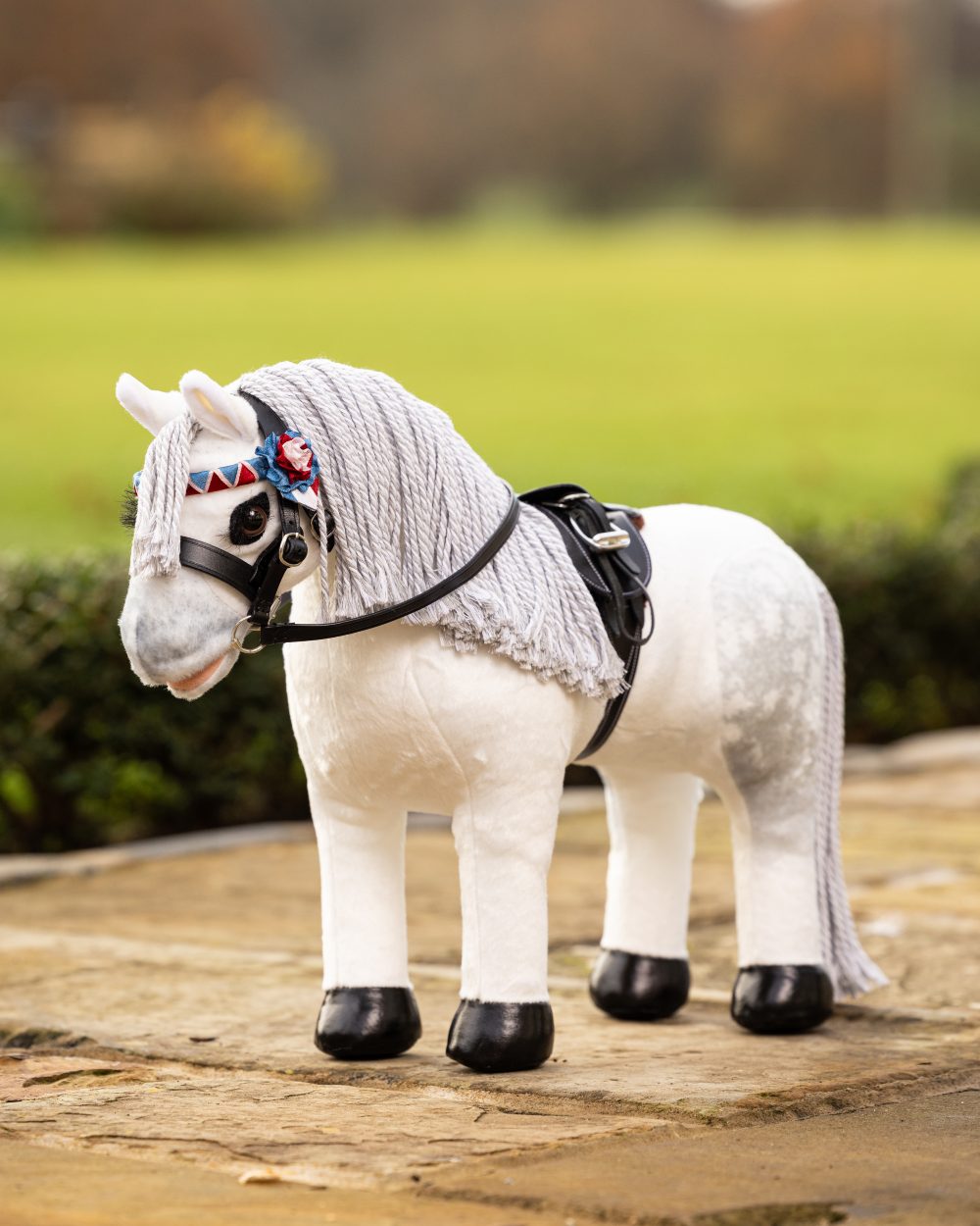 LeMieux Toy Pony Coco On A Outer Yard Background