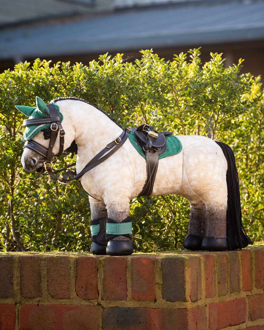 Evergreen coloured LeMieux Toy Pony Fly Hood on green background 