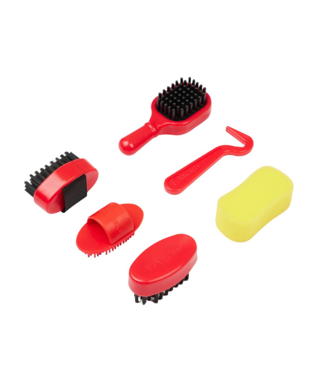 Ember Coloured LeMieux Toy Pony Grooming Kit On A White Background 