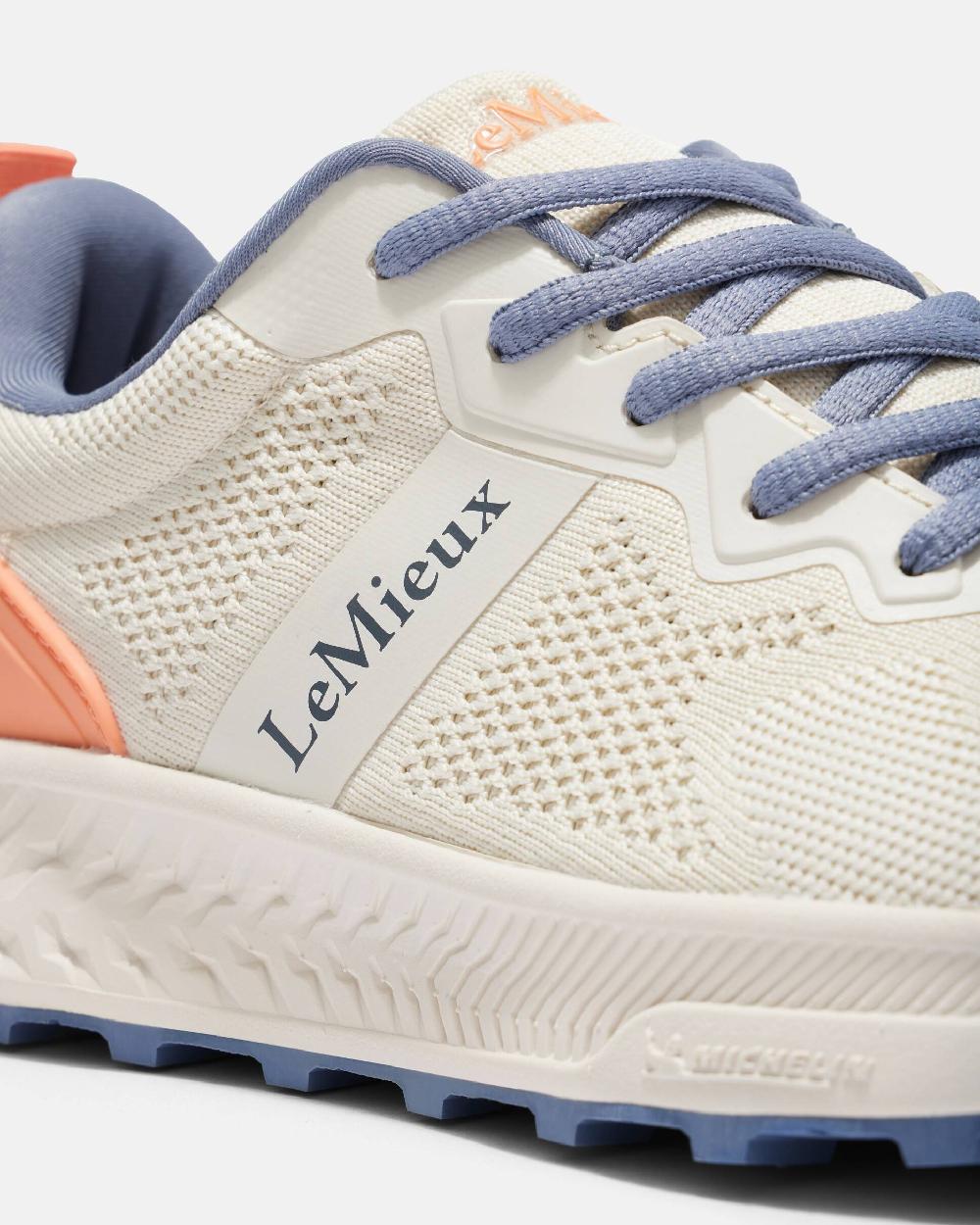 Ecru coloured LeMieux Trax-Lite Trainer on grey background 