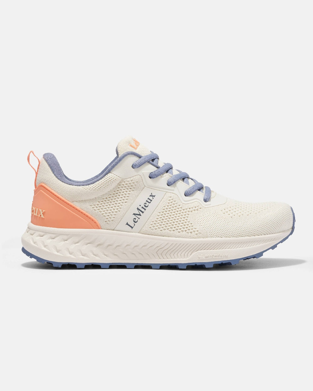 Ecru coloured LeMieux Trax-Lite Trainer on grey background 