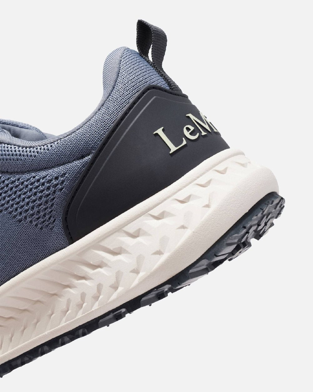 Jay Blue coloured LeMieux Trax-Lite Trainer on grey background 