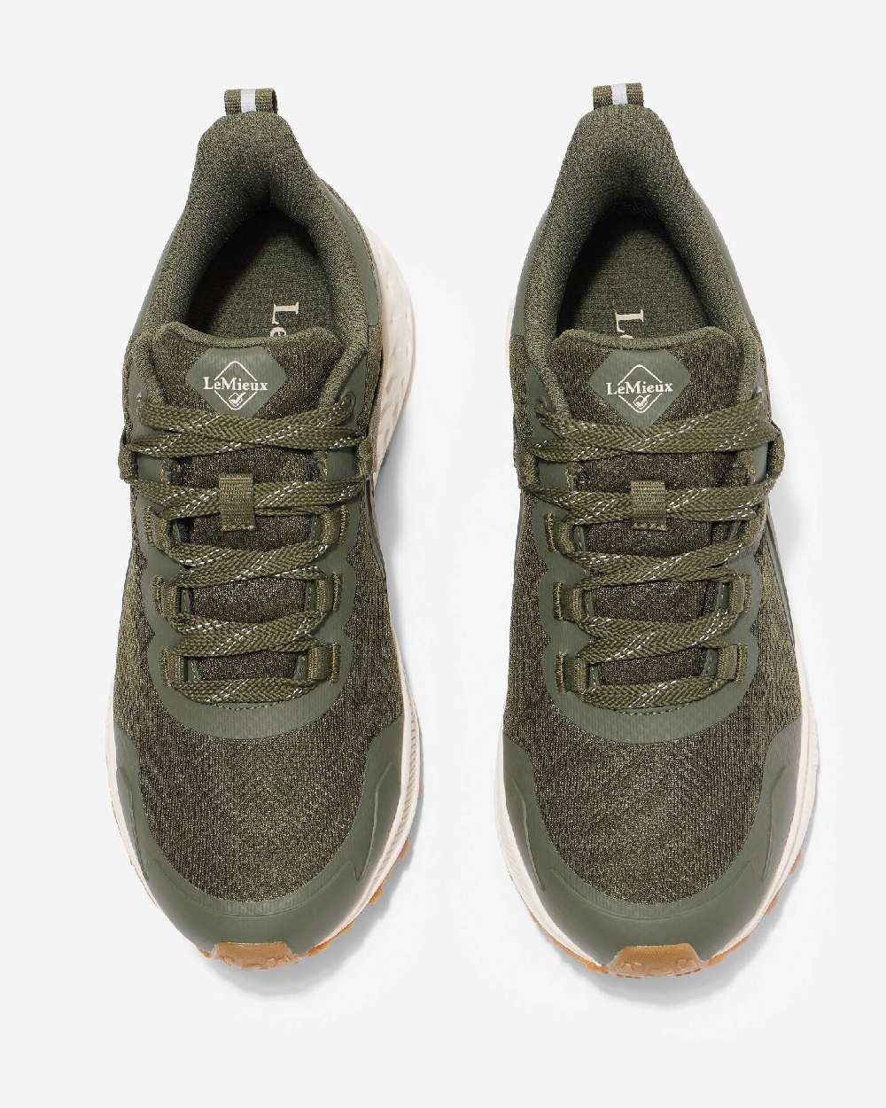 Khaki coloured LeMieux Trax Waterproof Trainers on grey background 