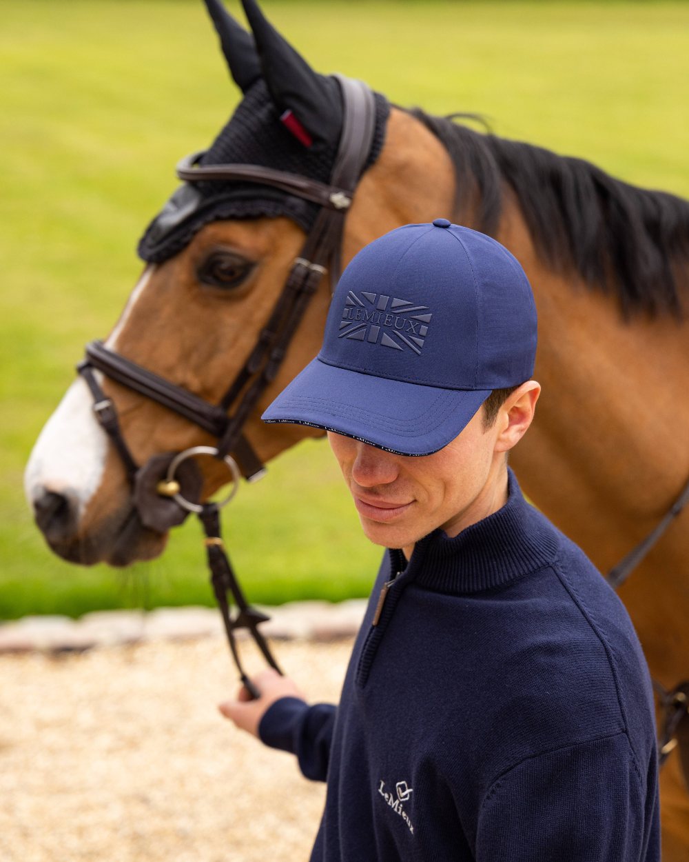 Navy coloured LeMieux Union Jack Baseball Cap with horse in background 