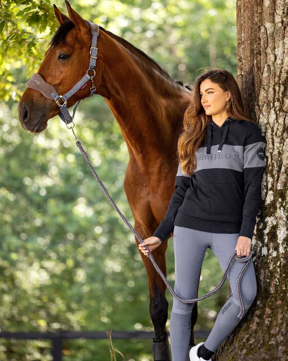 Jay Blue coloured LeMieux Vogue Headcollar &amp; Leadrope on forest background 