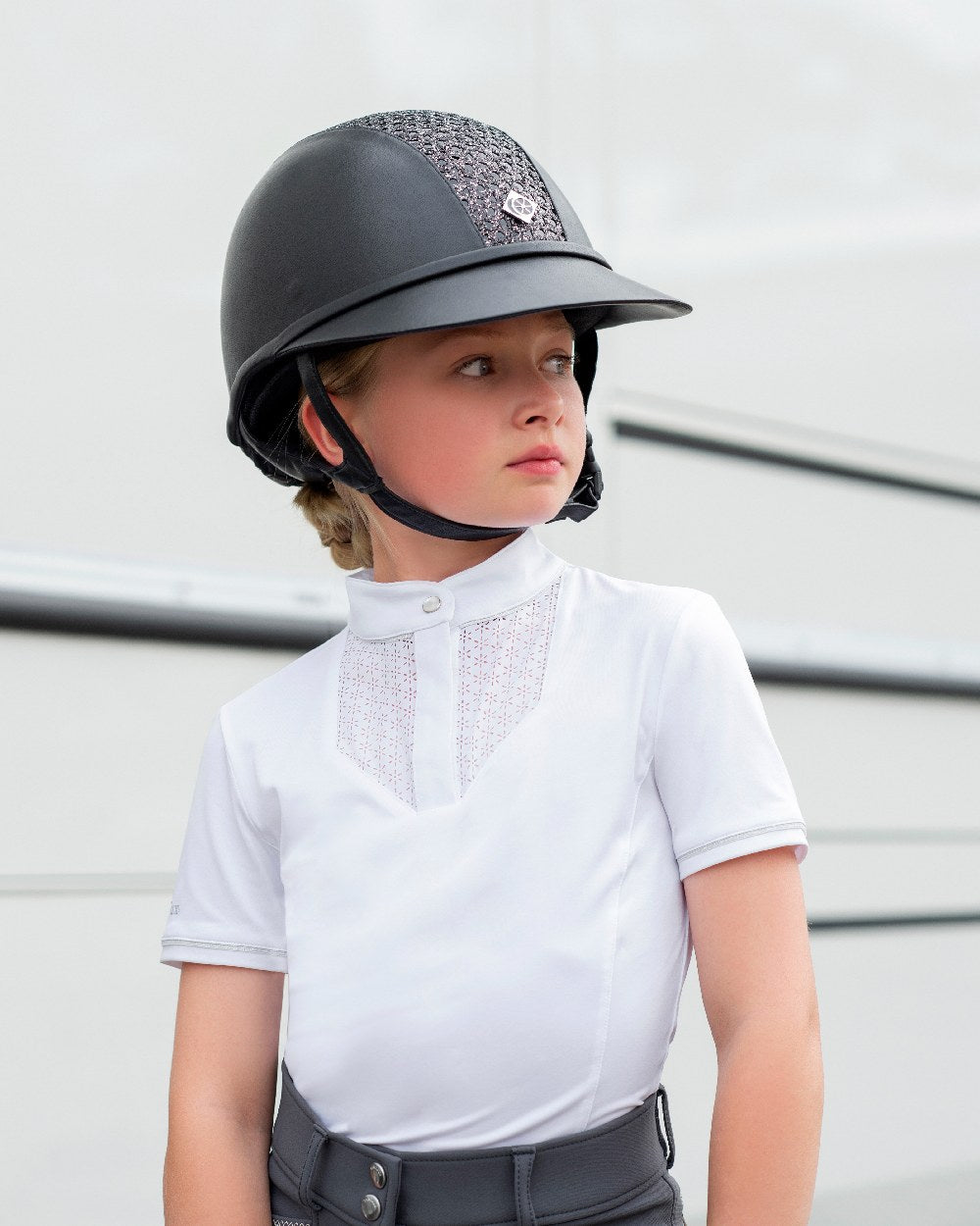 White coloured LeMieux Young Rider Belle Show Shirts on grey background 