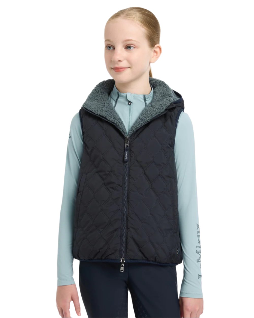 Navy Coloured LeMieux Young Rider Eloise Reversible Winter Gilet On A White Background 