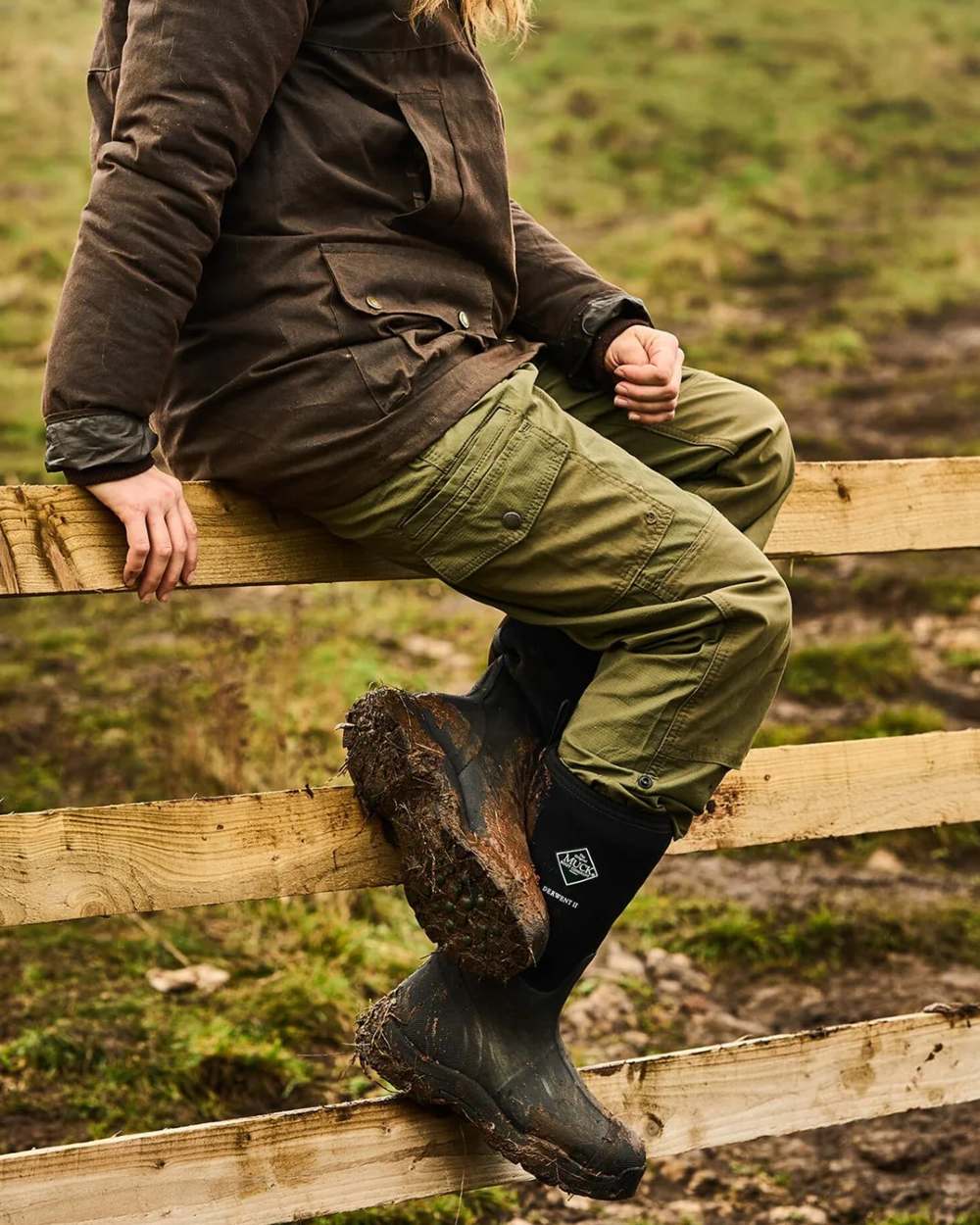 Camo Print Coloured Muck Boots Derwent II Wellingtons On A Forest Background 