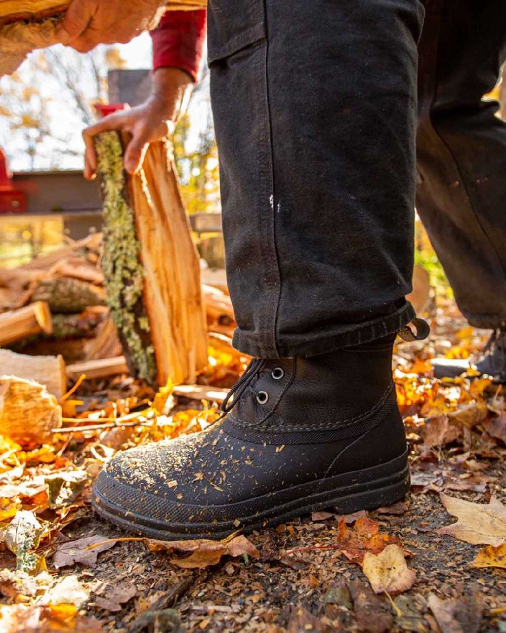 Black Coloured Muck Boots Mens Originals Duck Lace-Up Leather Short Boots on Outdoor Background
