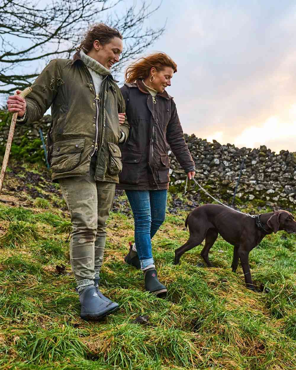 Grey Plaid Print Coloured Muck Boots Womens Originals Pull-On Ankle Boots On A Hill Background 